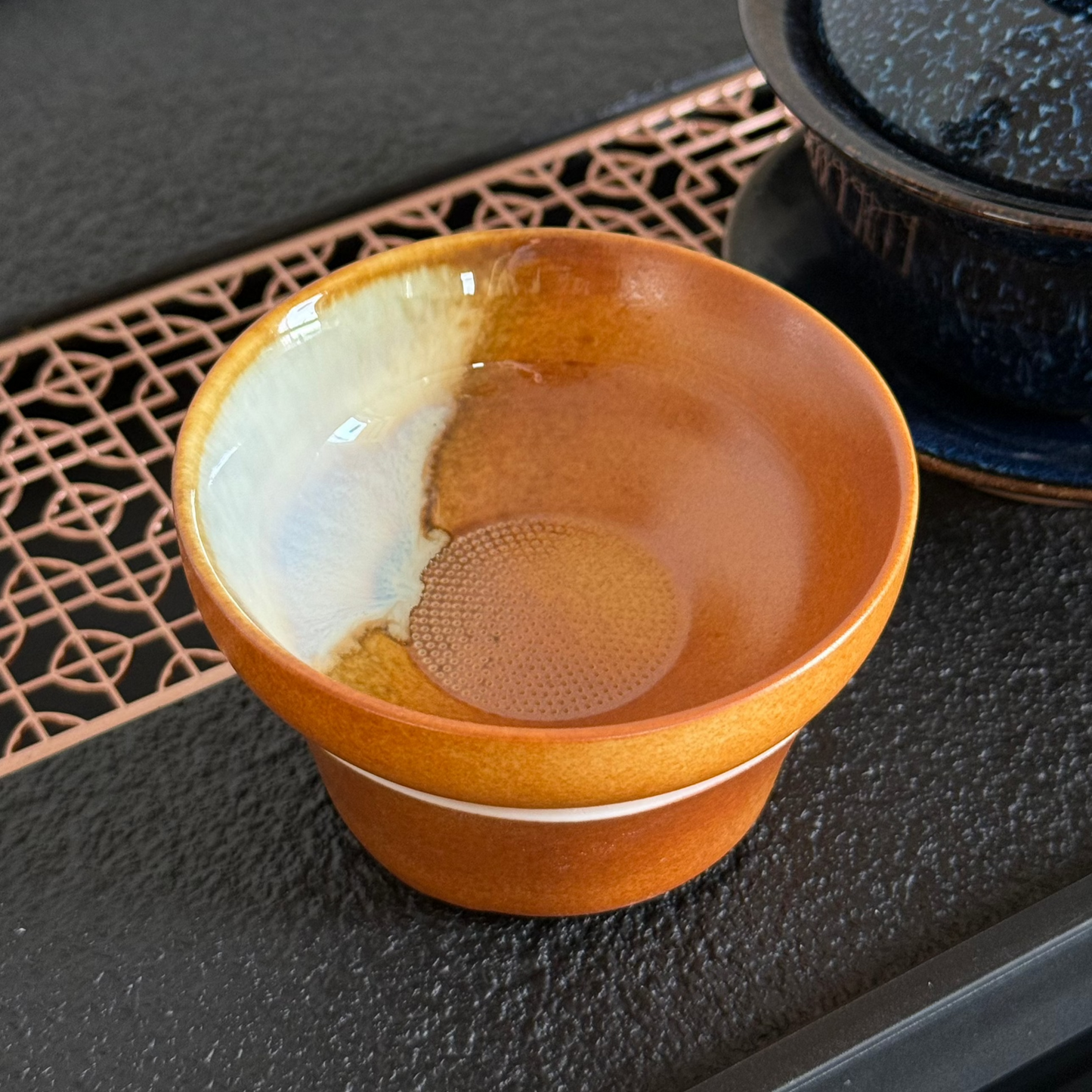Ochre Tea Strainer with Glaze Drip