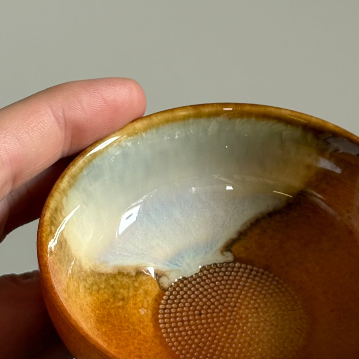 Ochre Tea Strainer with Glaze Drip