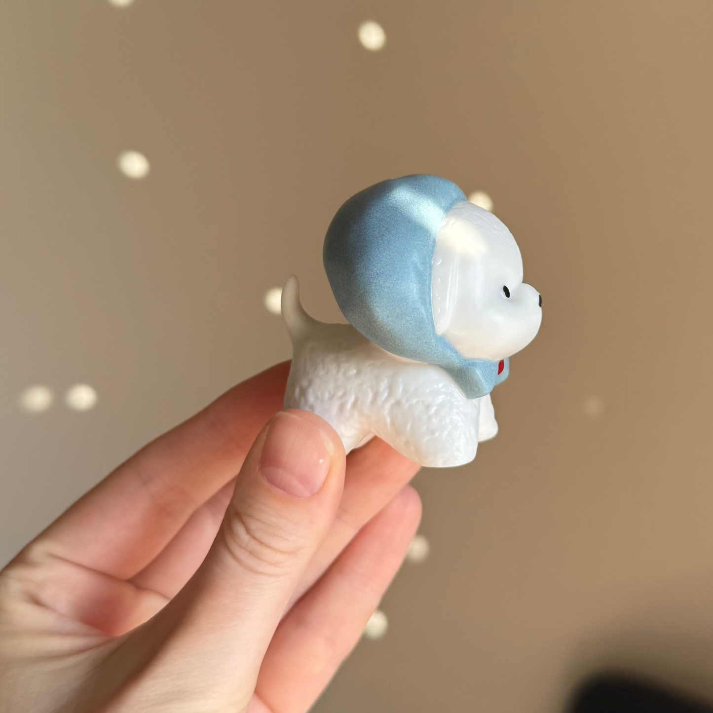 Porcelain Little Dog in a Blue Bonnet